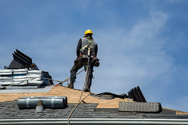 Professional Roof Replacement technician working in Old Bethpage, NY